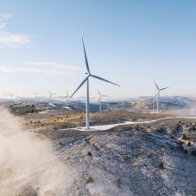 wind turbines across top of mountains