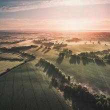 landscape of fields and sunset