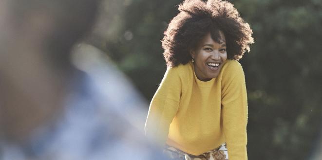 Lady looking very happy and smiling