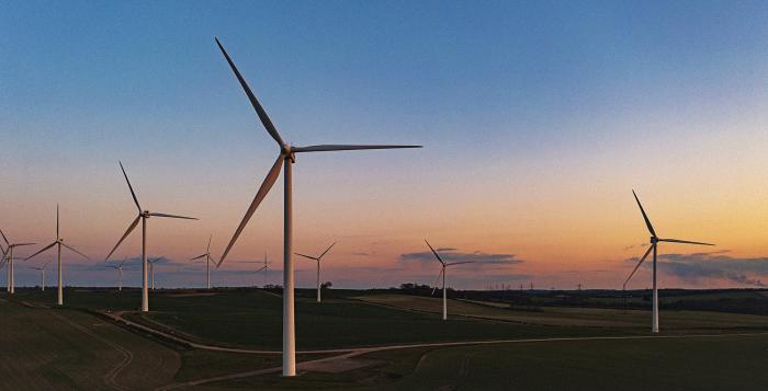 Wind turbines in the sunrise