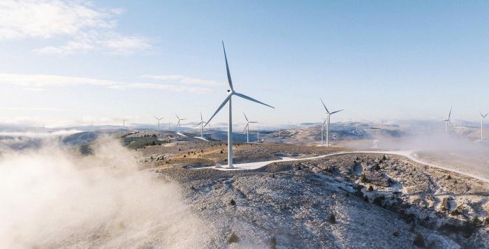 wind turbines across top of mountains