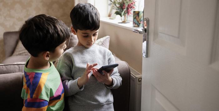 Children looking at a tablet