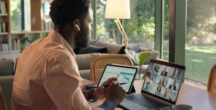 Man on team call with team members