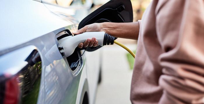 Person charging their car