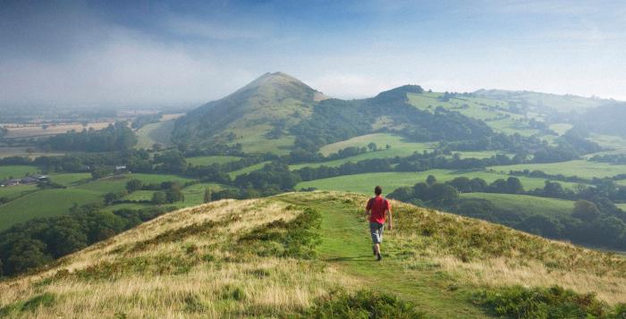 Person walking on a mountain path